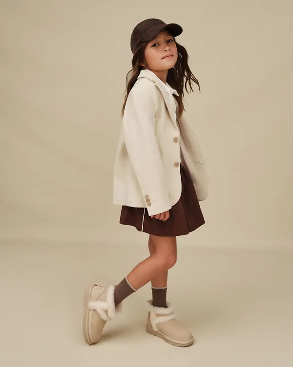 A girl wearing our Classic Mini II Heritage.